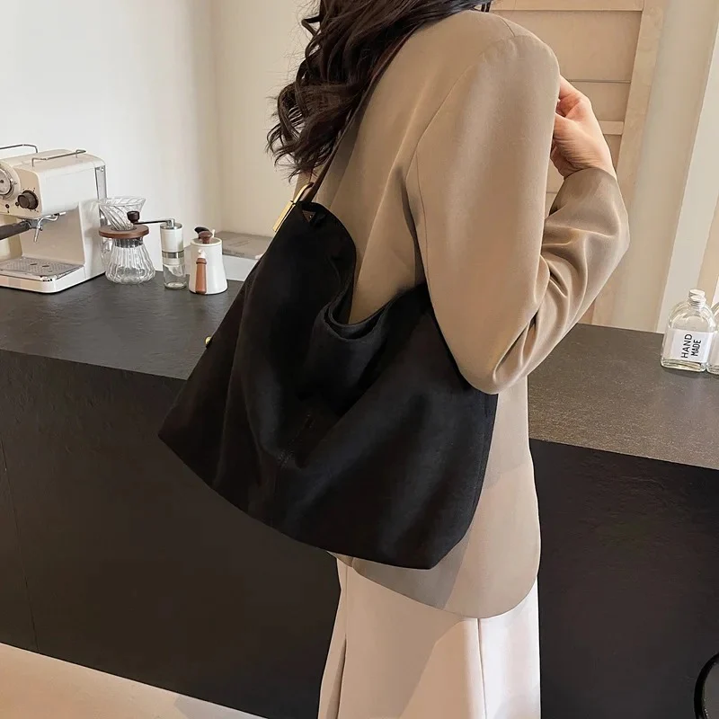 Edna Lock Suede Bag