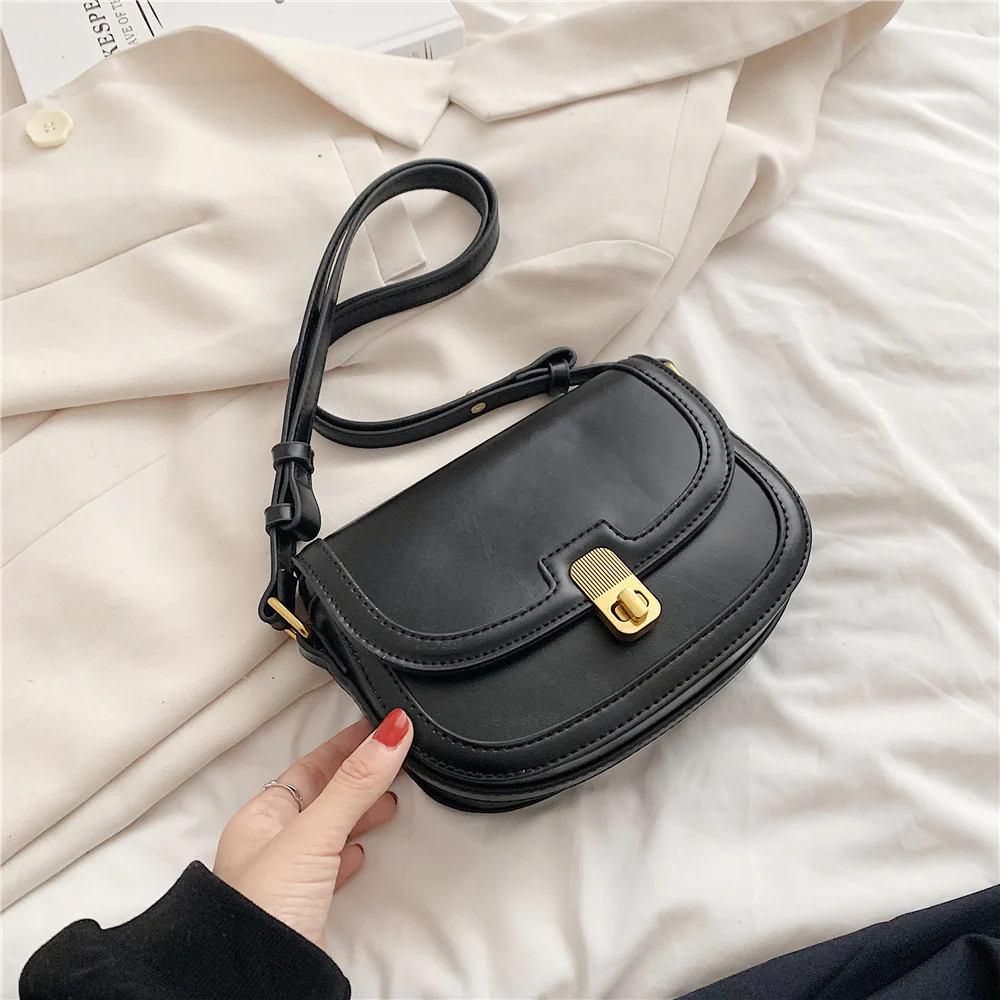 Turn Lock Crossbody