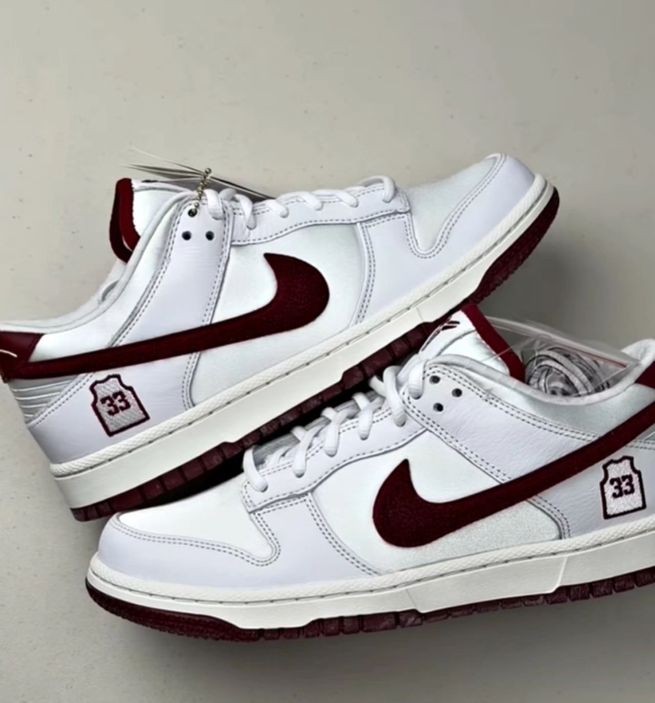 Nike Dunk Low White Burgundy Fuzzy Swoosh 33 Jersey Burgundy Outsole