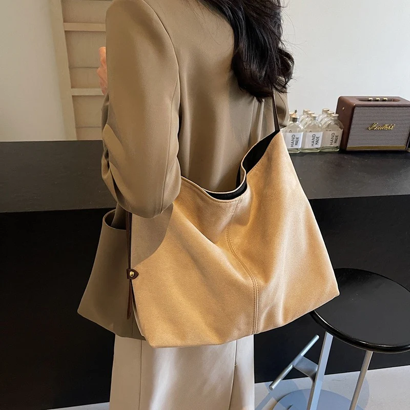 Edna Lock Suede Bag
