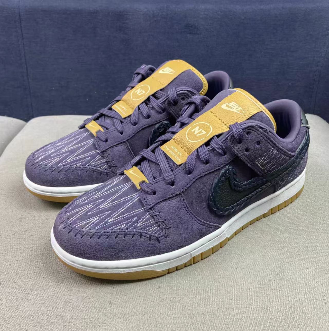 Nike Dunk Low Dark Purple Suede Braided Swoosh Stitch Pattern Gum Outsole