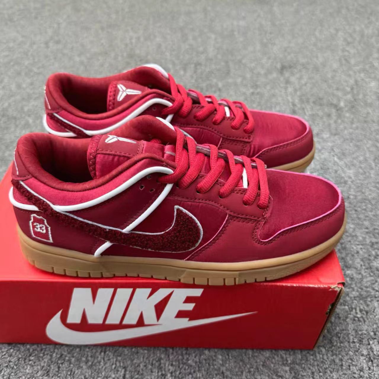 Nike Dunk Low Burgundy Satin Fuzzy Swoosh 33 Jersey Gum Outsole