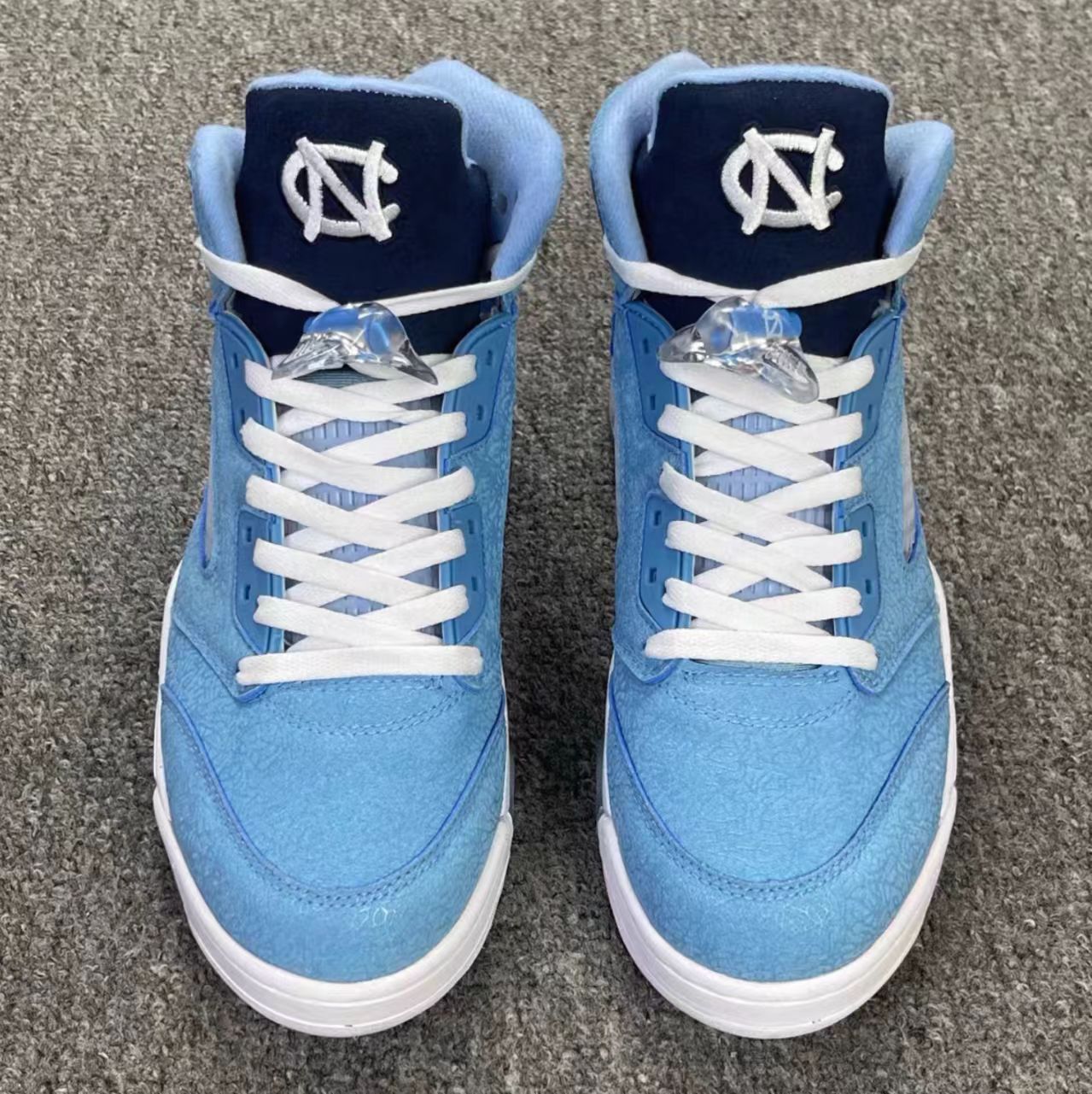 Air Jordan 5 Retro UNC University Blue Cracked Leather Sneaker