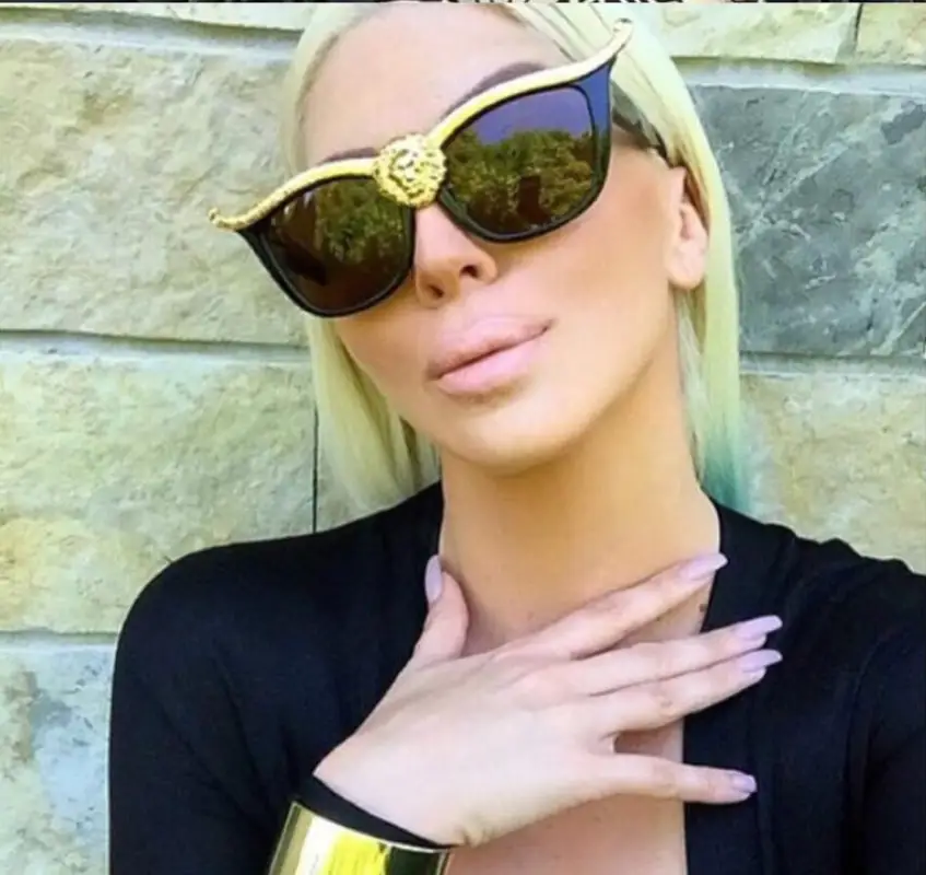 Blue Haired Woman with Lion Head Sunglasses