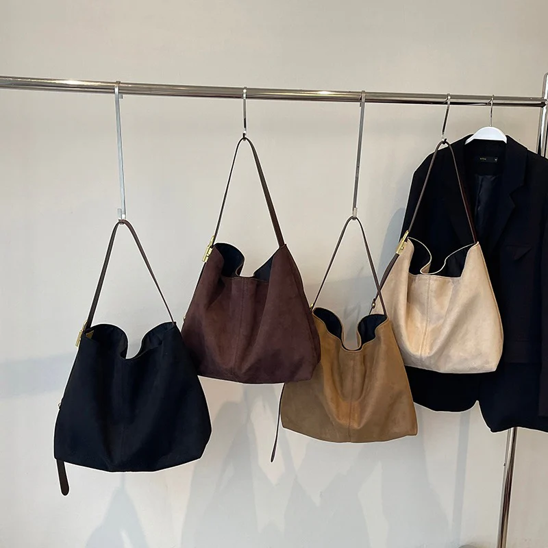 Edna Lock Suede Bag