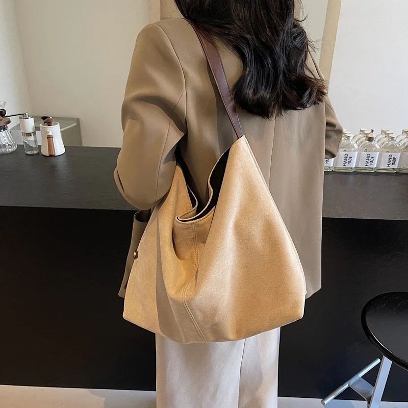 Edna Lock Suede Bag