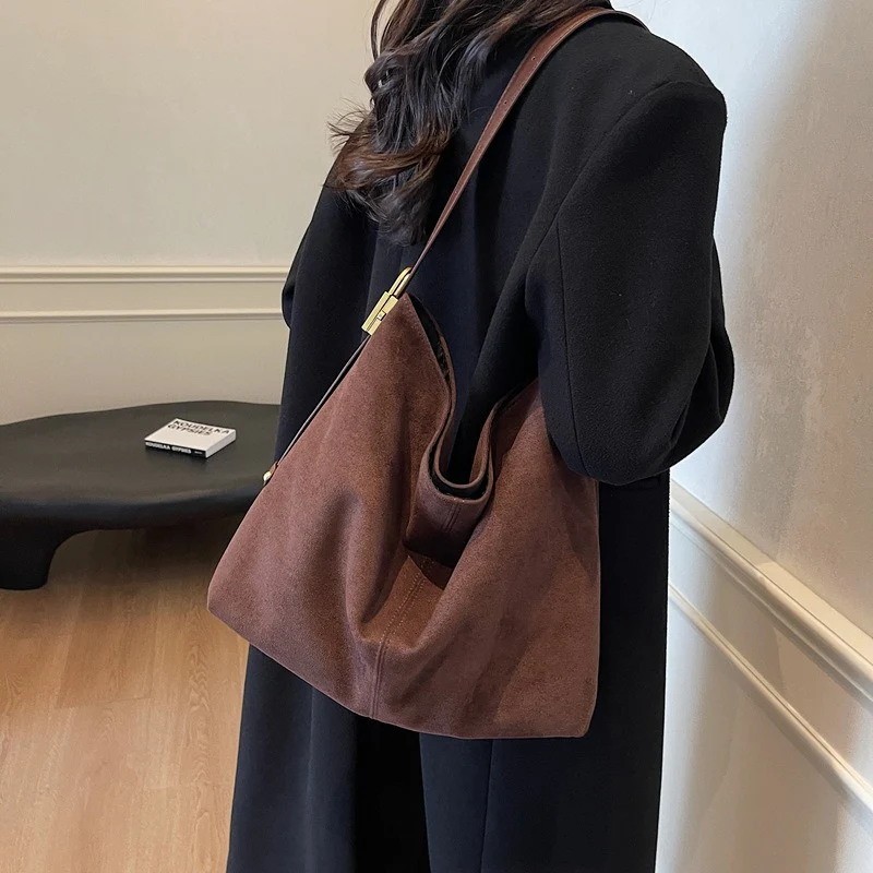 Edna Lock Suede Bag