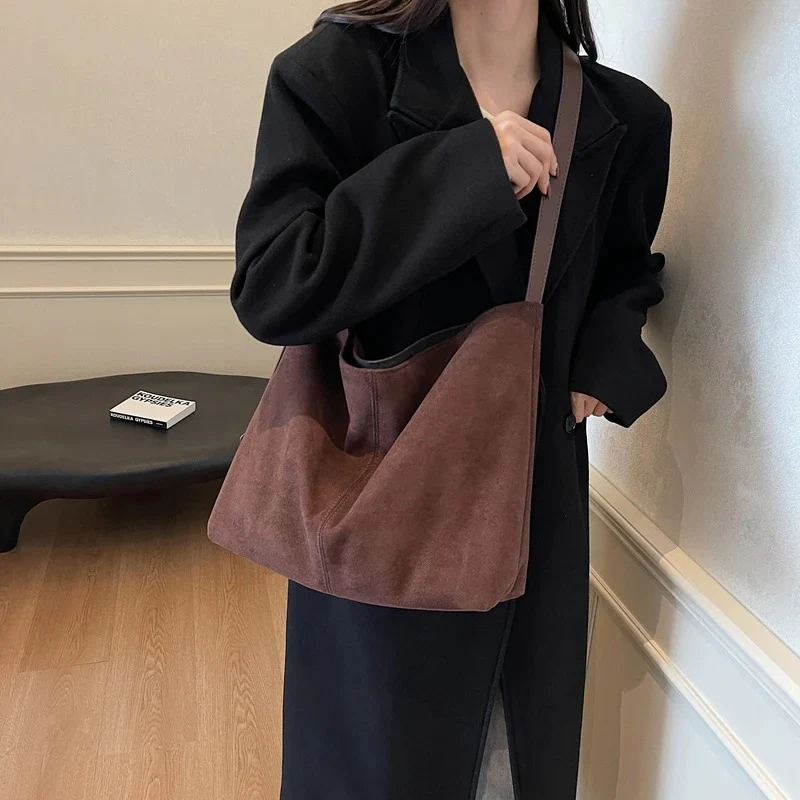 Edna Lock Suede Bag