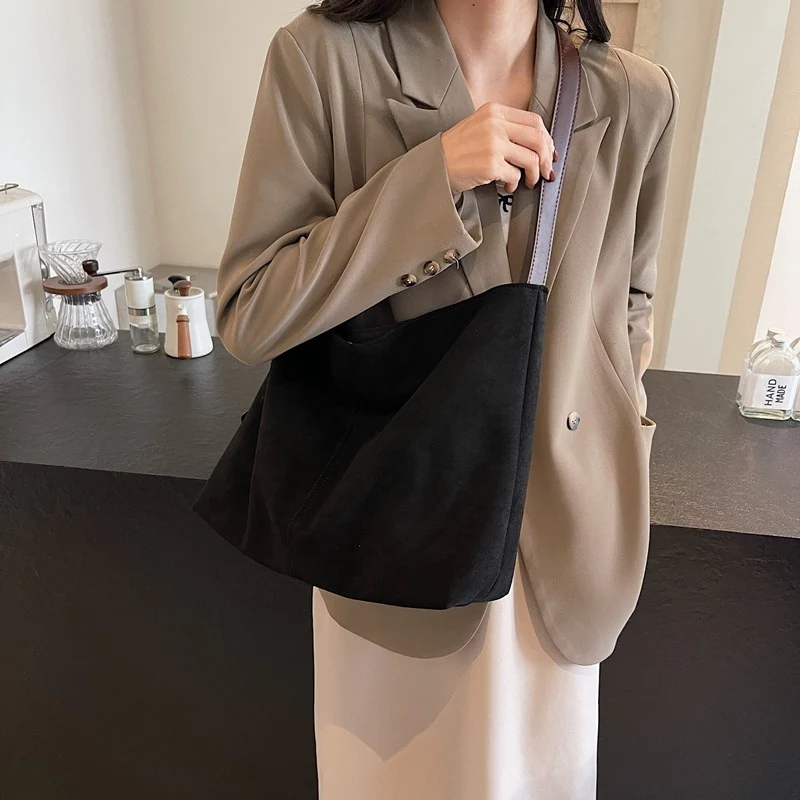 Edna Lock Suede Bag