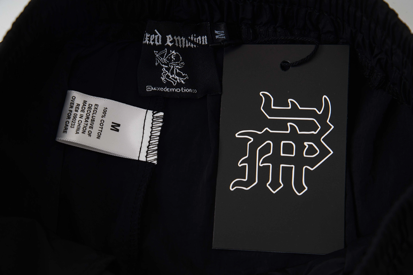 Mixed Emotion Rose Crest Track Pants (Black/Red)