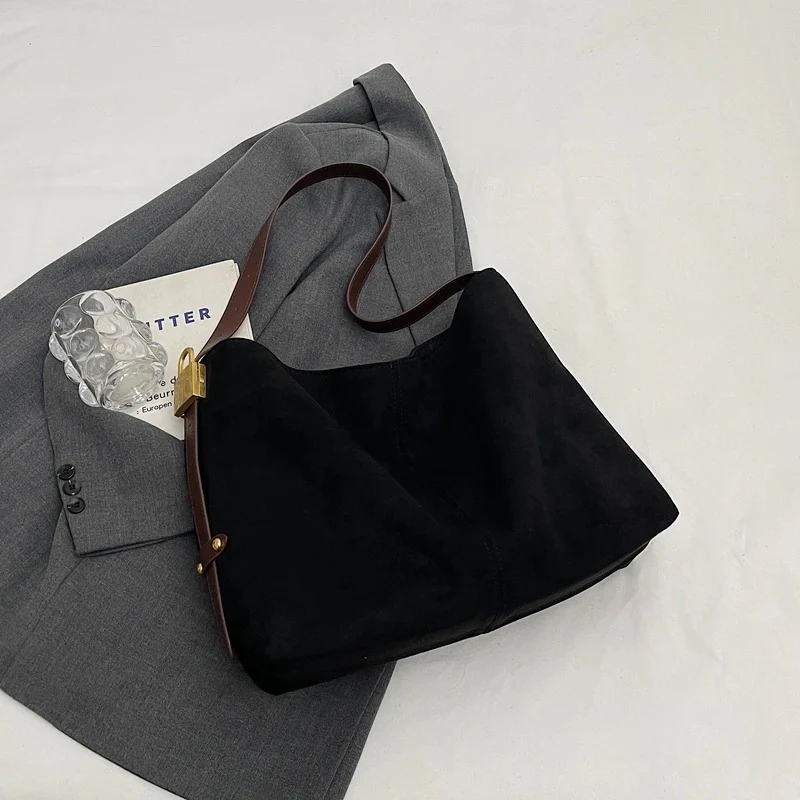 Edna Lock Suede Bag