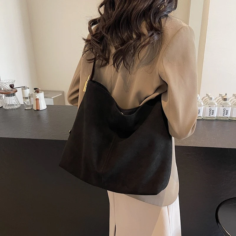 Edna Lock Suede Bag