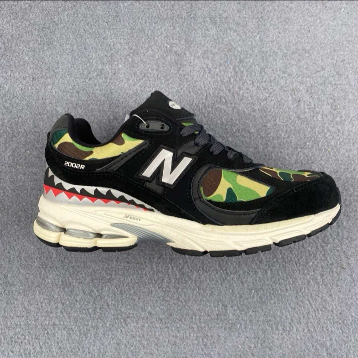 A BATHING APE® × New Balance 2002R 