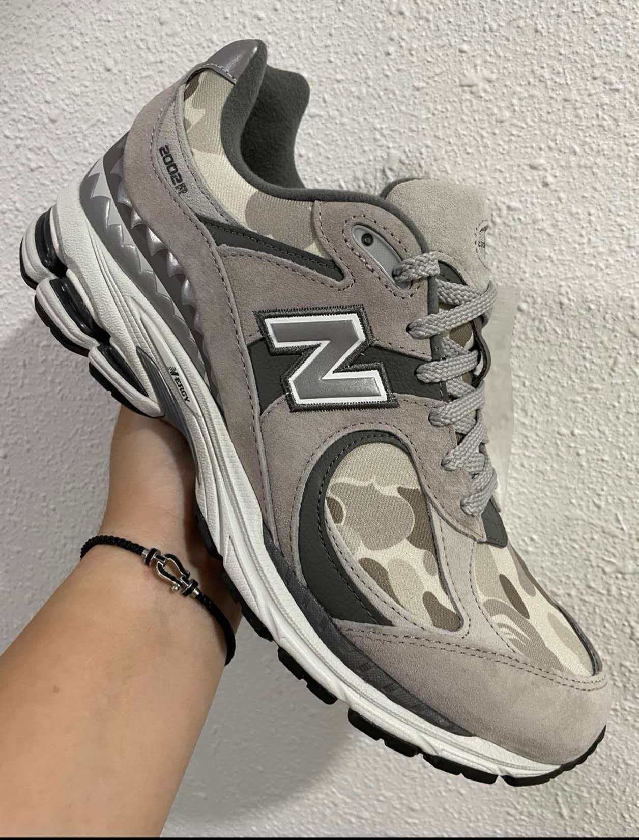 A BATHING APE® × New Balance 2002R 