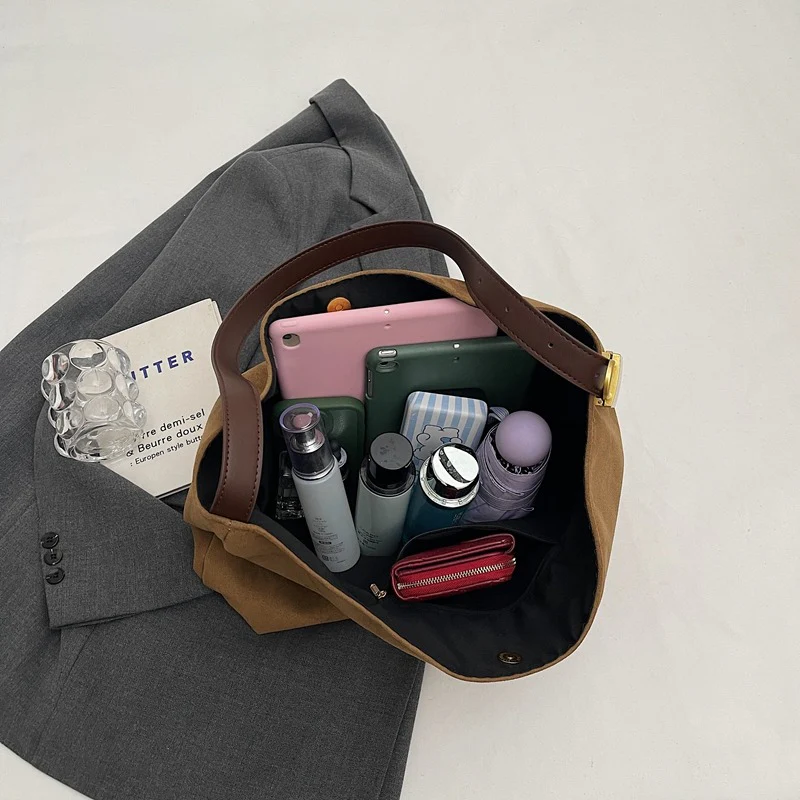 Edna Lock Suede Bag