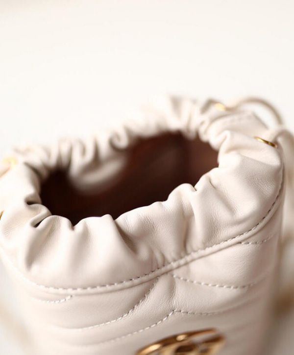 Gucci GG Marmont Mini White Matelasse Quilted Leather Brass Interlocking GG Design Drawstring Closure Women Chian Buckle 575163 DTDRT 9022