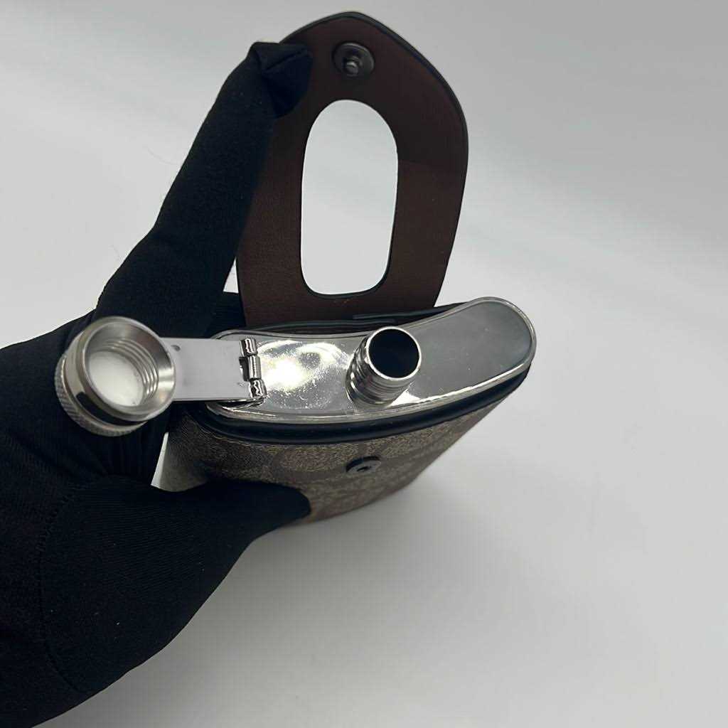 Coach Outlet Flask In Signature Canvas