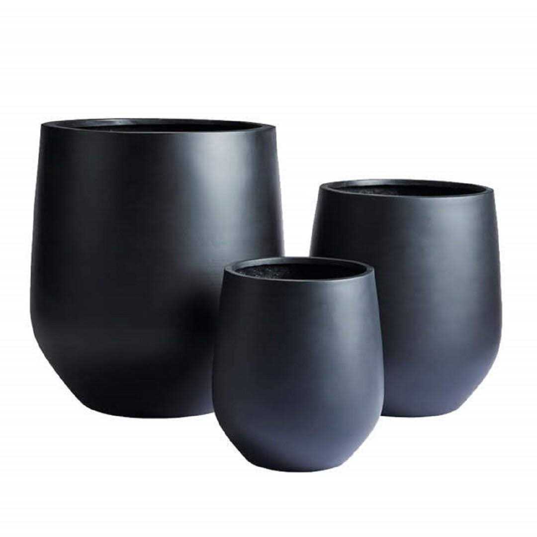 Dorlis Fiberstone Pot Planter Orren Ellis