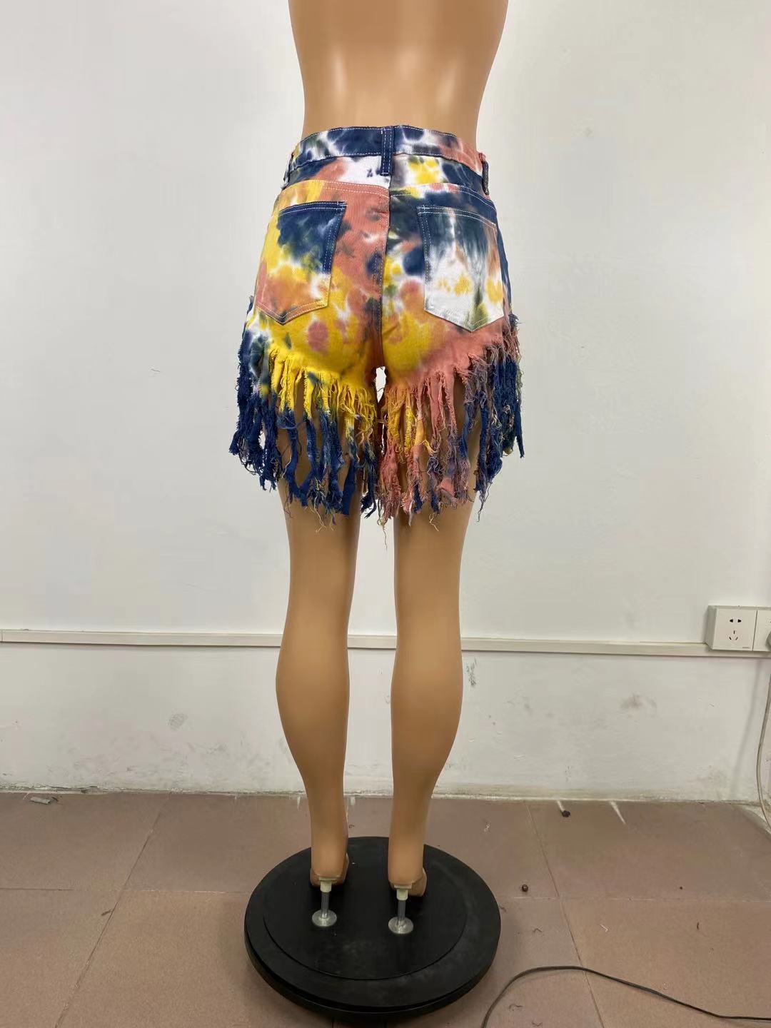 Tie dyed denim shorts with tassels