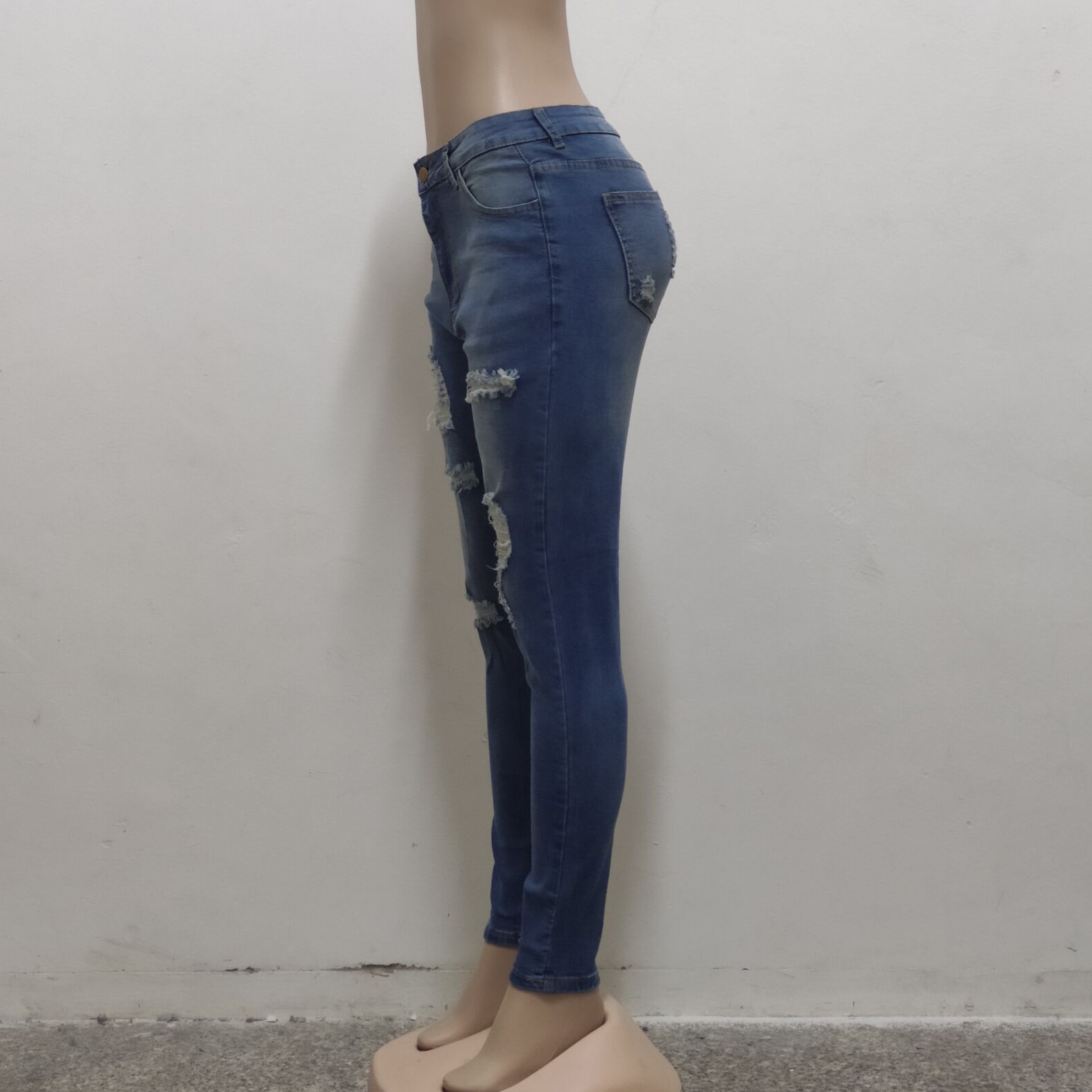 Fashion high waist jeans with holes