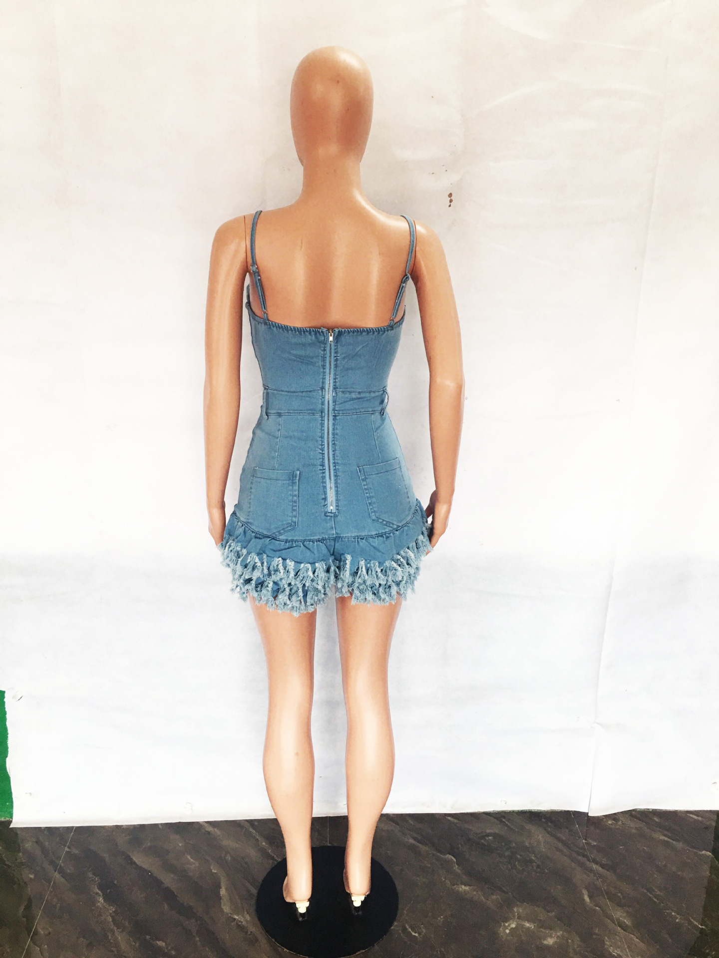 Fashionable suspender fringed raw edge denim jumpsuit