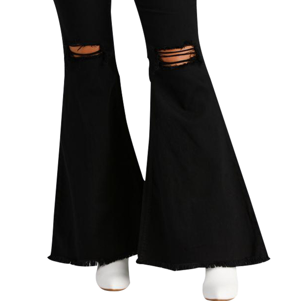 Jeans flared trousers with broken knees