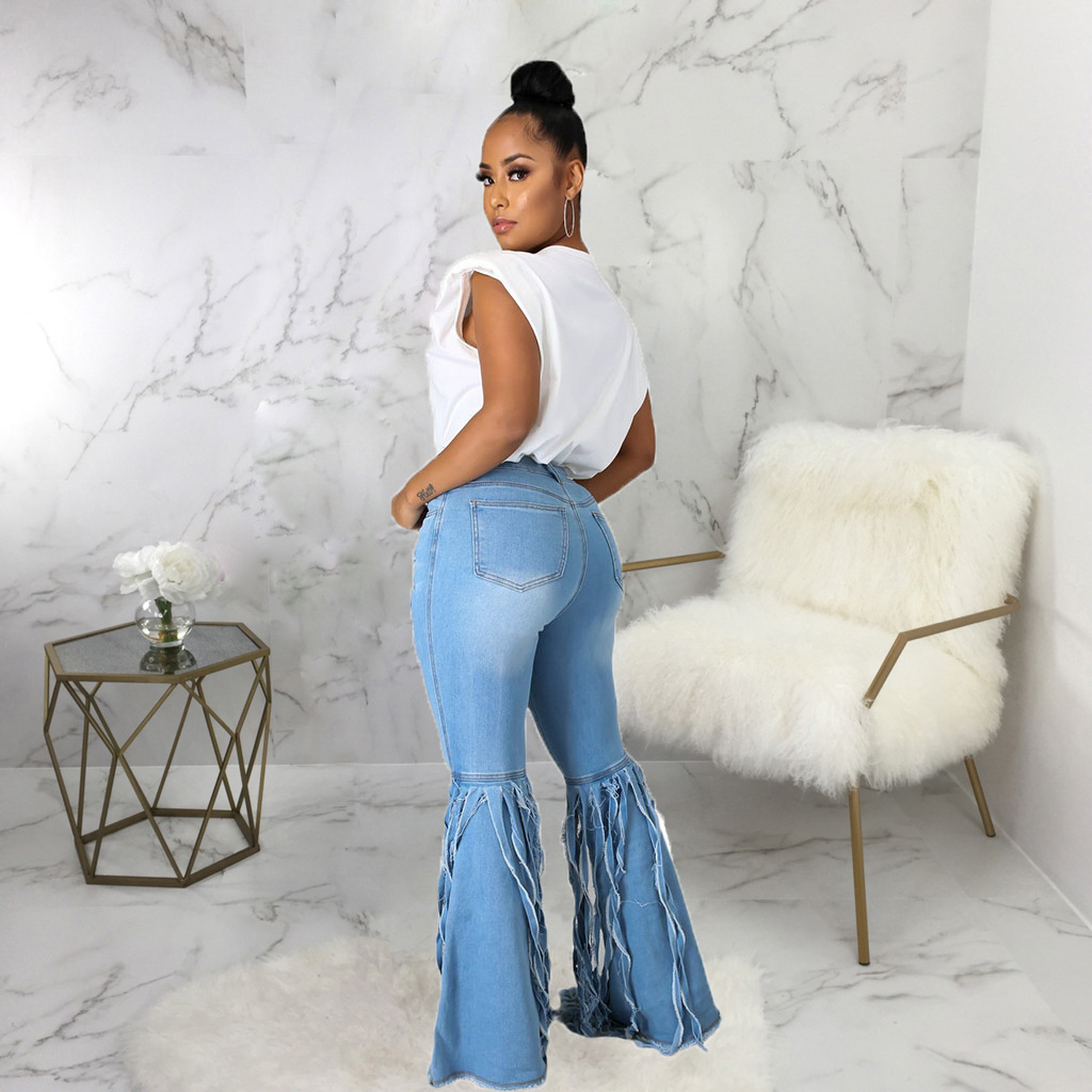 Sexy fashion tassel pierced elastic flared pants