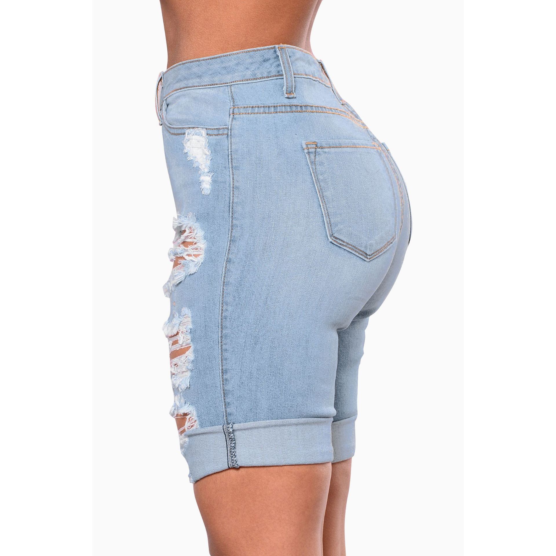 Fashionable water wash hole high waist jeans