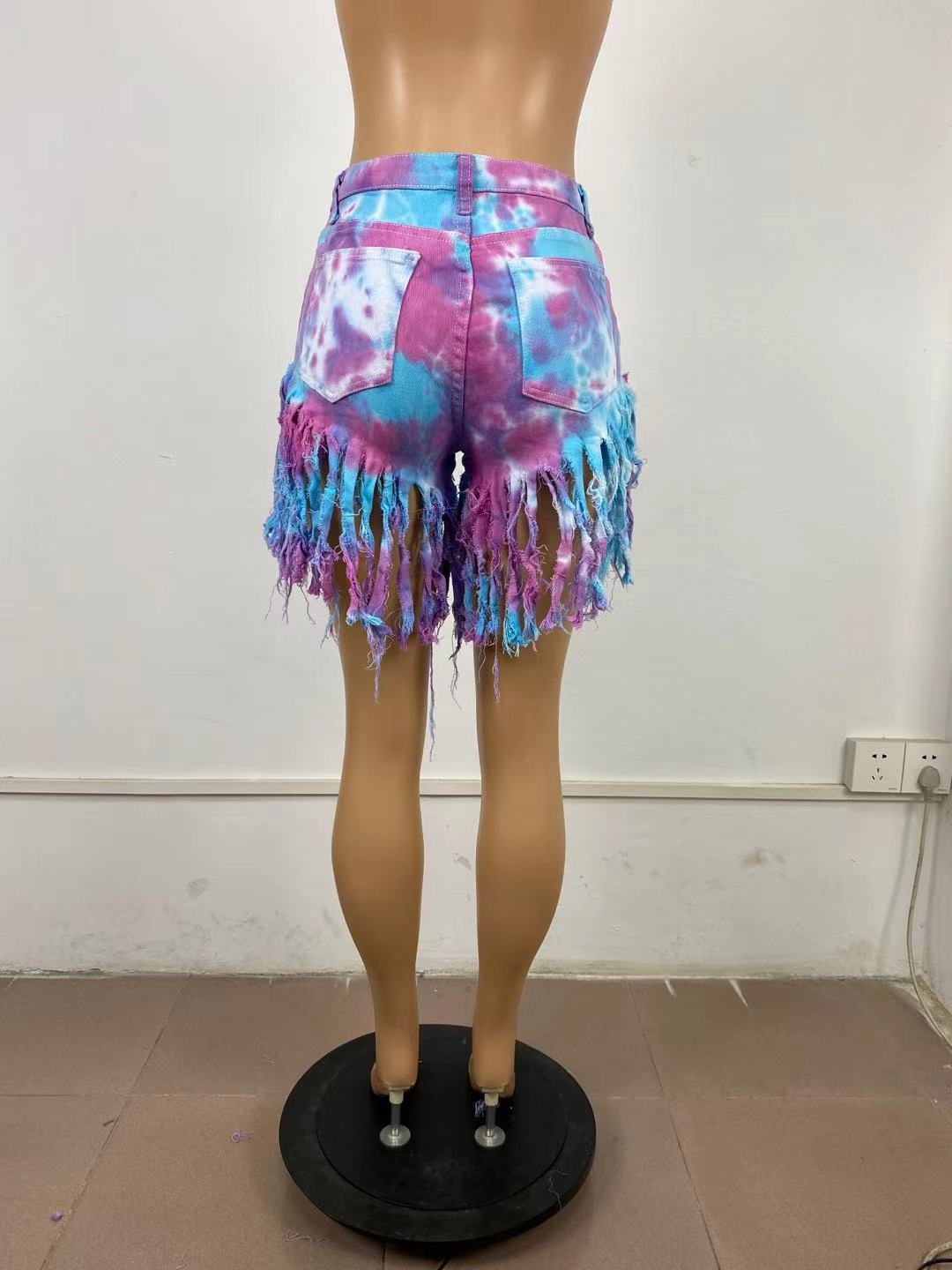 Tie dyed denim shorts with tassels
