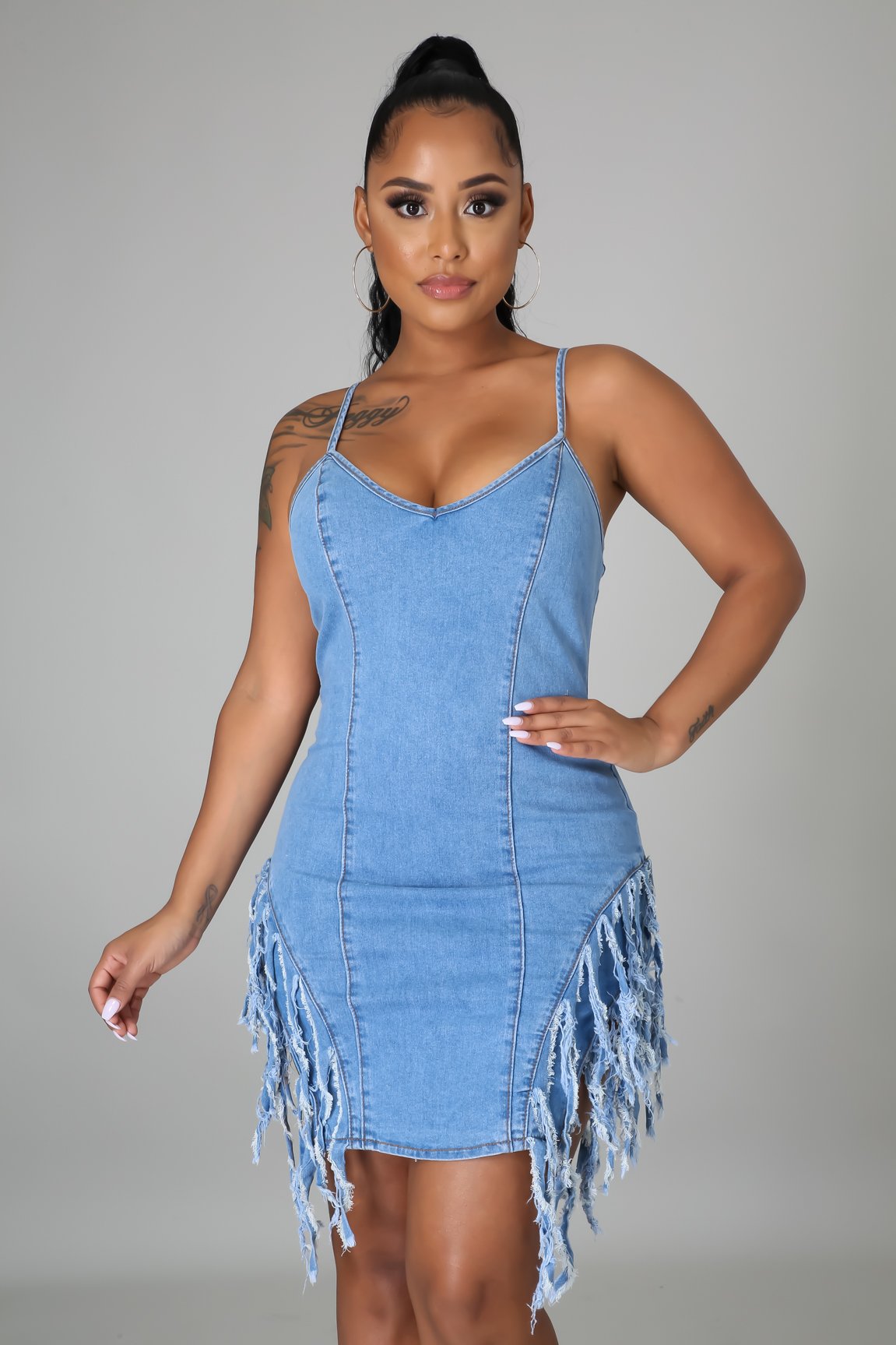 Fashionable open back denim skirt with strap