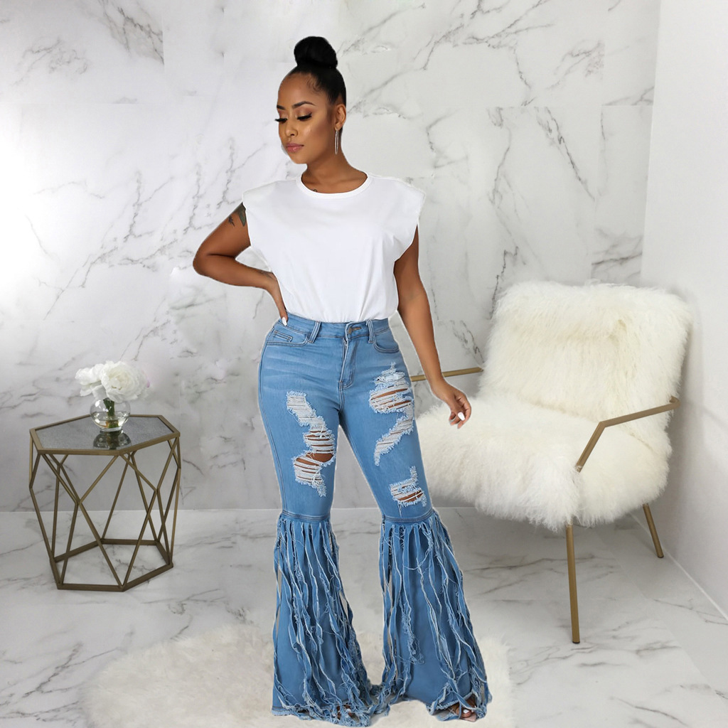 Sexy fashion tassel pierced elastic flared pants