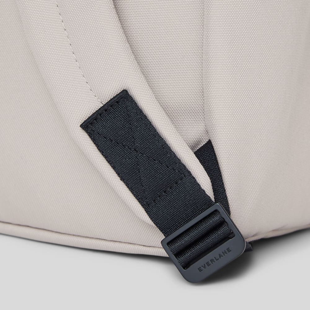 The ReNew Transit Backpack | Warm Quartz (with label)