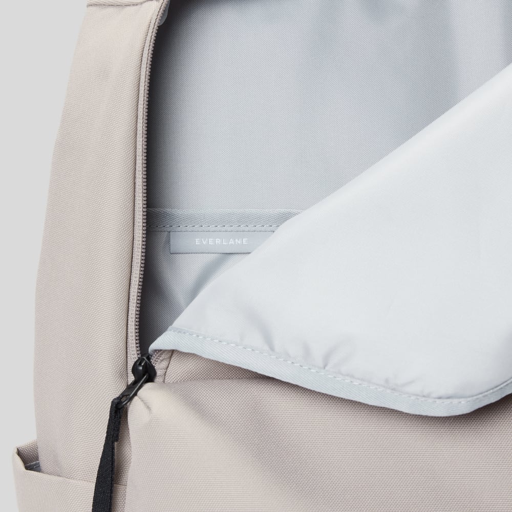 The ReNew Transit Backpack | Warm Quartz (with label)