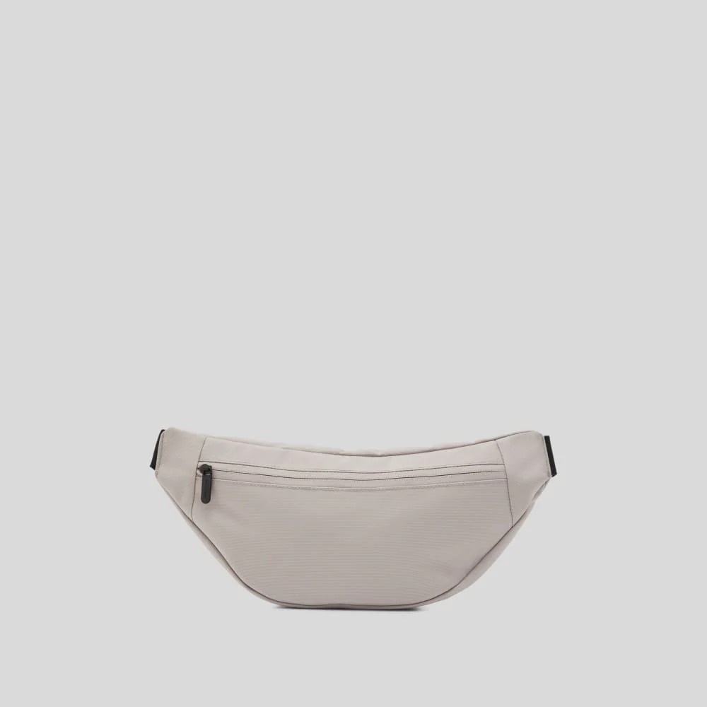 The Renew Transit Fanny Pack | Warm Quartz (with label)