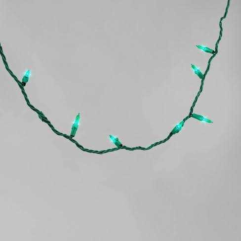 Wondershop 60ct LED Smooth Mini Christmas String Lights Warm White with Green Wire