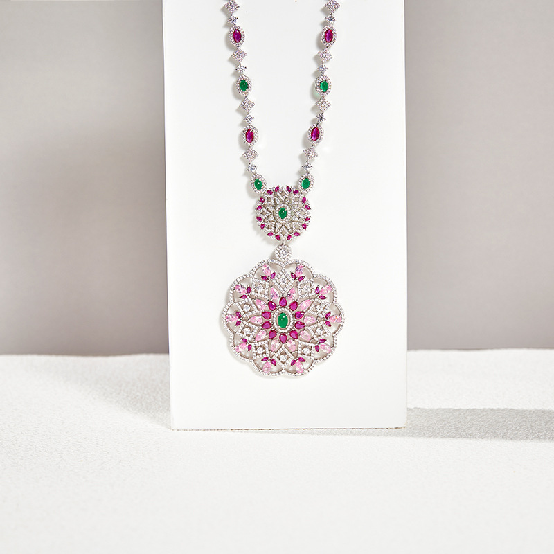 Golden Bloom Hollow Pear-Shaped Floral Pendant Necklace