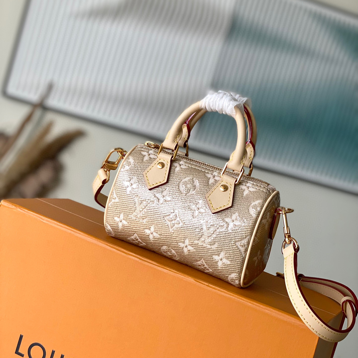 Louis Vuitton  Gold Printed Handbag